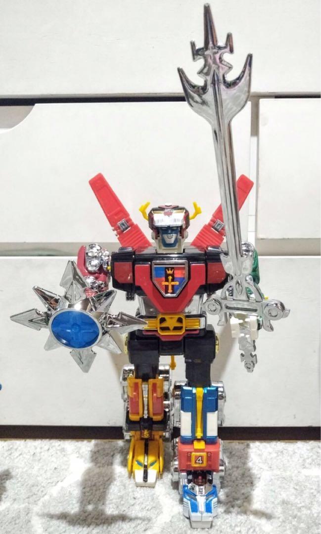 Metal voltron toy top