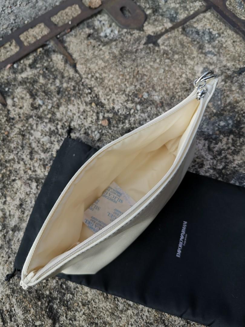 ARMANI POUCH (Category: Purses & Pouches) located in Nilai. Submitted by byzhanefirdaus (Listing ID 1026277686, Image 3). Description: # BRAND NEW # EMPORIO ARMANI POUCH # CREAM COLOUR # COMES WITH A BLACK DUST BAG - CLEARING OUT MY COLLECTION - THANK YOU.