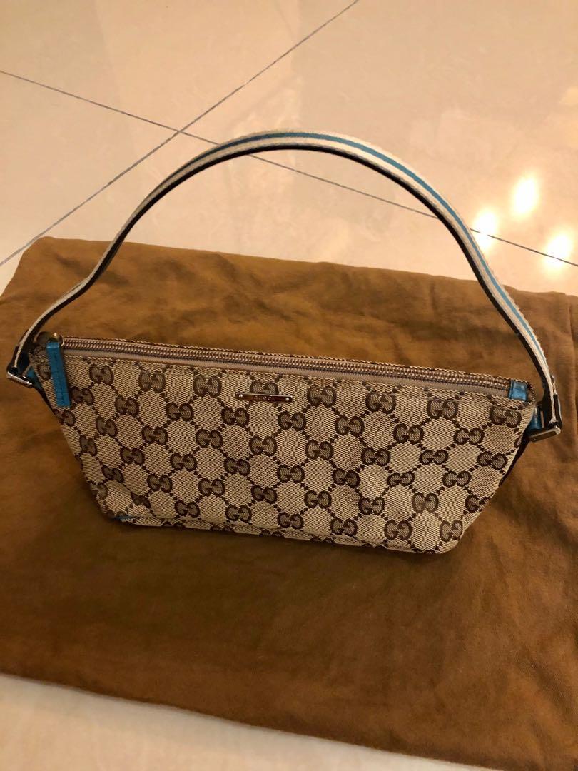 Gucci Brown Diamanté Canvas Boat Pochette, Women's Fashion, Bags & Wallets,  Purses & Pouches on Carousell