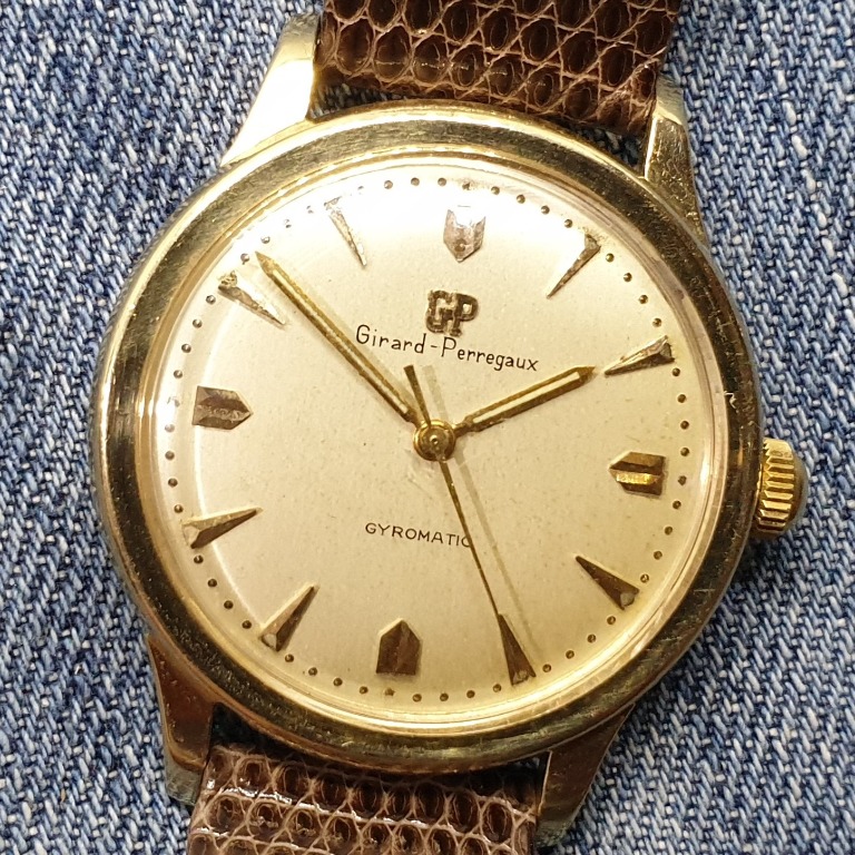Girard perregaux online gyromatic 14k gold