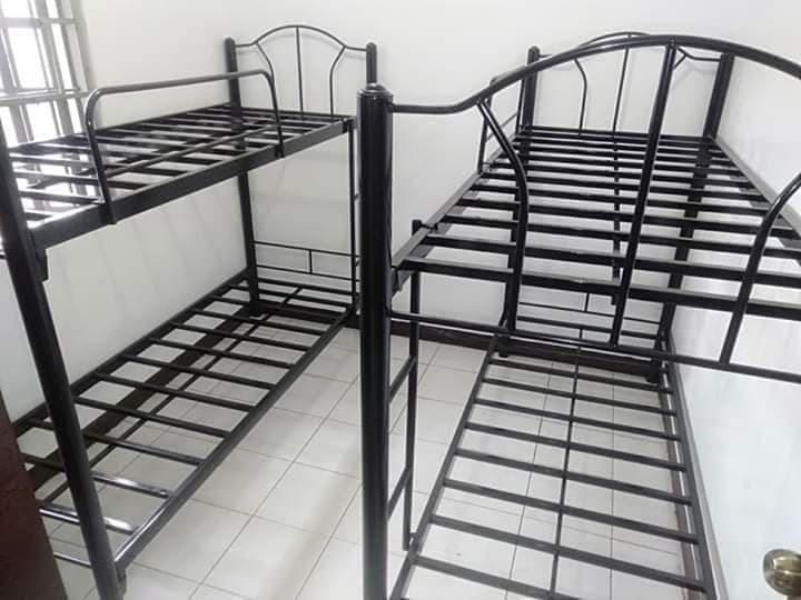 double deck bunkbed (Category: Bed Frames & Mattresses) located in Manila. Submitted by zhellesperas (Listing ID 1026450744, Image 1). Description: double deck tubing type single size,black color only metal,size 30x30x75,good quality and heavy duty,we accept bulk orders and ready for delivery..