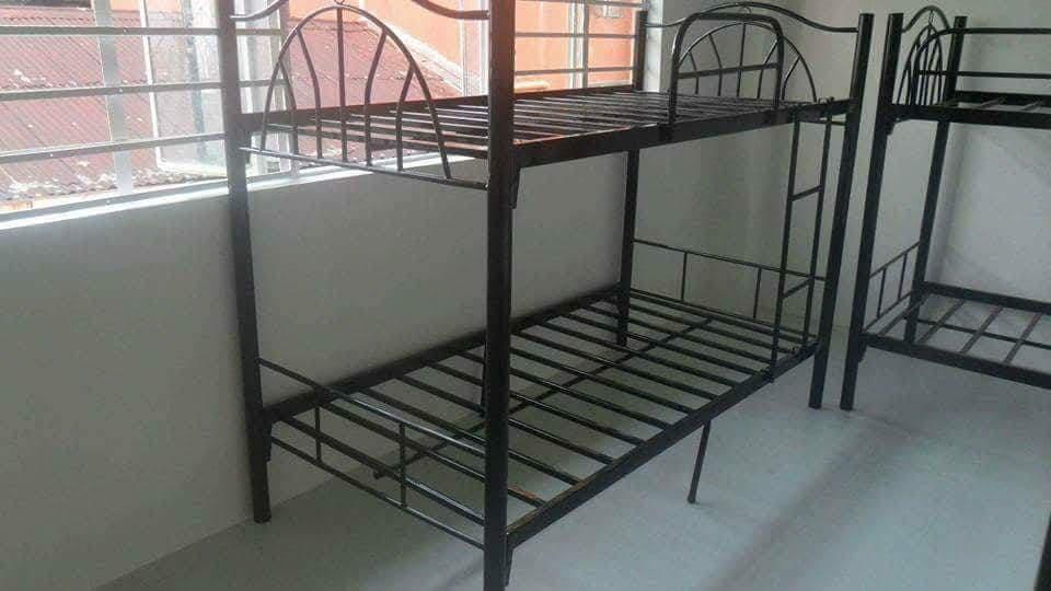 double deck bunkbed (Category: Bed Frames & Mattresses) located in Manila. Submitted by zhellesperas (Listing ID 1026450744, Image 3). Description: double deck tubing type single size,black color only metal,size 30x30x75,good quality and heavy duty,we accept bulk orders and ready for delivery..