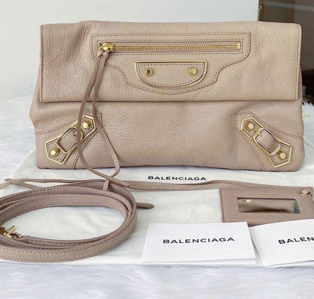 Authentic Balenciaga metallic envelope clutch / sling, Luxury, & Wallets Carousell