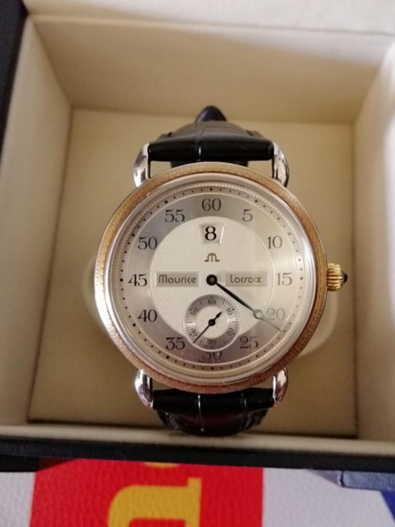 Maurice lacroix 28505 solid gold bezel watch