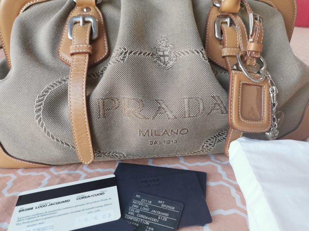 Prada Jacquard Logo handbag (Category: Luxury Bags & Wallets) located in Makati City. Submitted by denvergirl1119 (Listing ID 1026902737, Image 3). Description: Authentic preloved jacquard logo Prada handbag. With dustbag and authenticity cards. Gently used, with minimal signs of usage. Still nice..