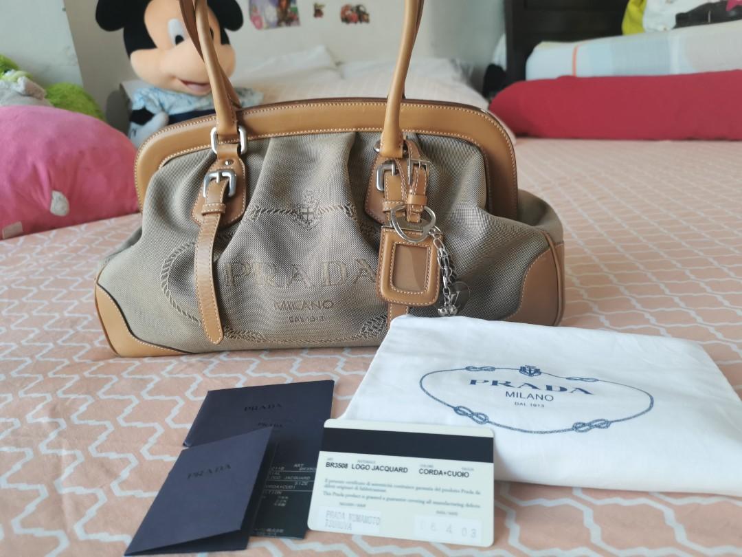 Prada Jacquard Logo handbag (Category: Luxury Bags & Wallets) located in Makati City. Submitted by denvergirl1119 (Listing ID 1026902737, Image 1). Description: Authentic preloved jacquard logo Prada handbag. With dustbag and authenticity cards. Gently used, with minimal signs of usage. Still nice..