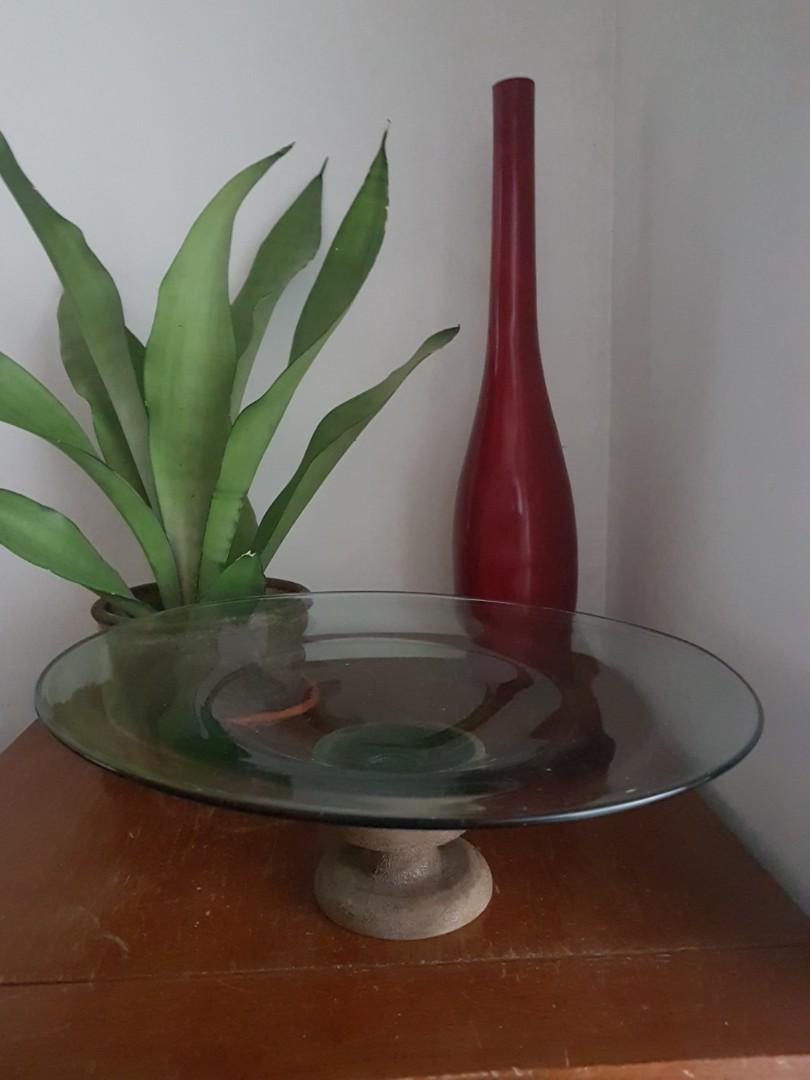 Round Glass Tray (Category: Other Kitchenware & Tableware) located in Taguig. Submitted by kimiabapo (Listing ID 1026780495, Image 1). Description: Glass Tray for sale (wooden stand not included) Can be used outdoor or indoor for flowers/plants or home decorative use 14" diameter 3 1/2 height P350 each, 1 unit available Locally-sourced from a glass manufacturer Barely used RFS: decluttering #treasure4.