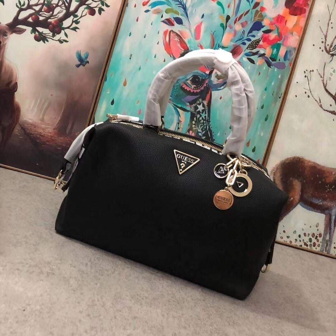 Guess top clutch price