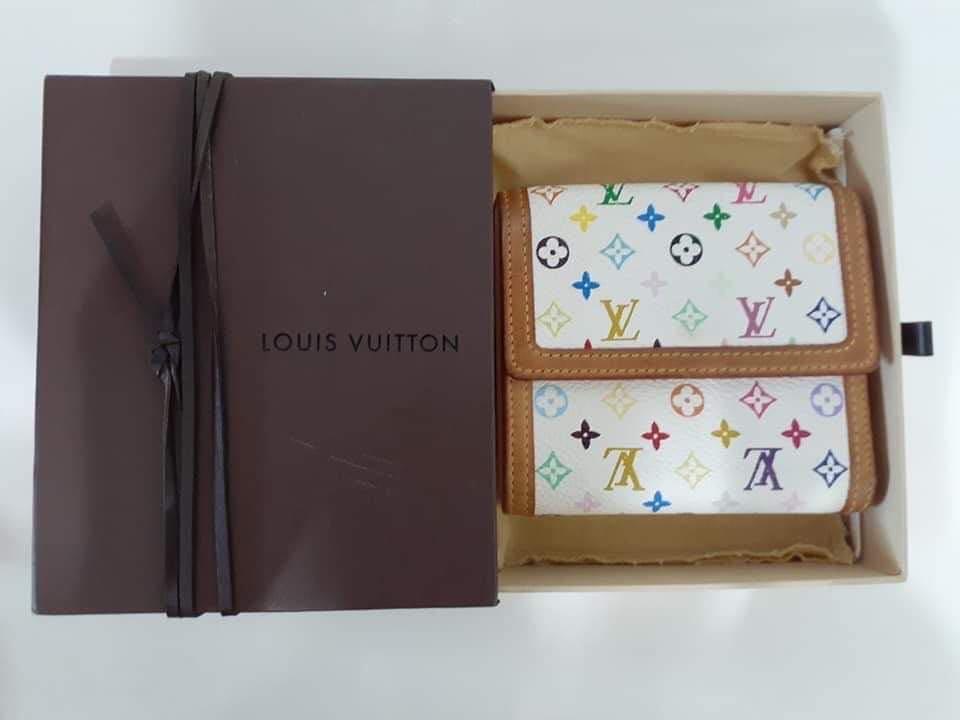 Pre loved LV monogram Multi colour trifold wallet (Category: Luxury Bags & Wallets) located in Paranaque City. Submitted by FLess.ph (Listing ID 1026971851, Image 1). Description: Pre loved LV monogram trifold wallet. Rank A. Php 16800 only.