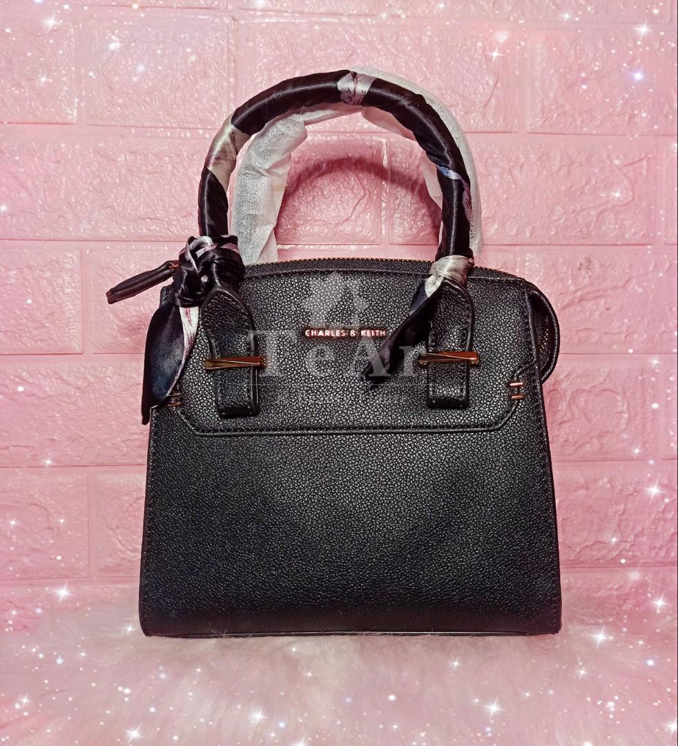 Scarf wrapped top outlet handle bag
