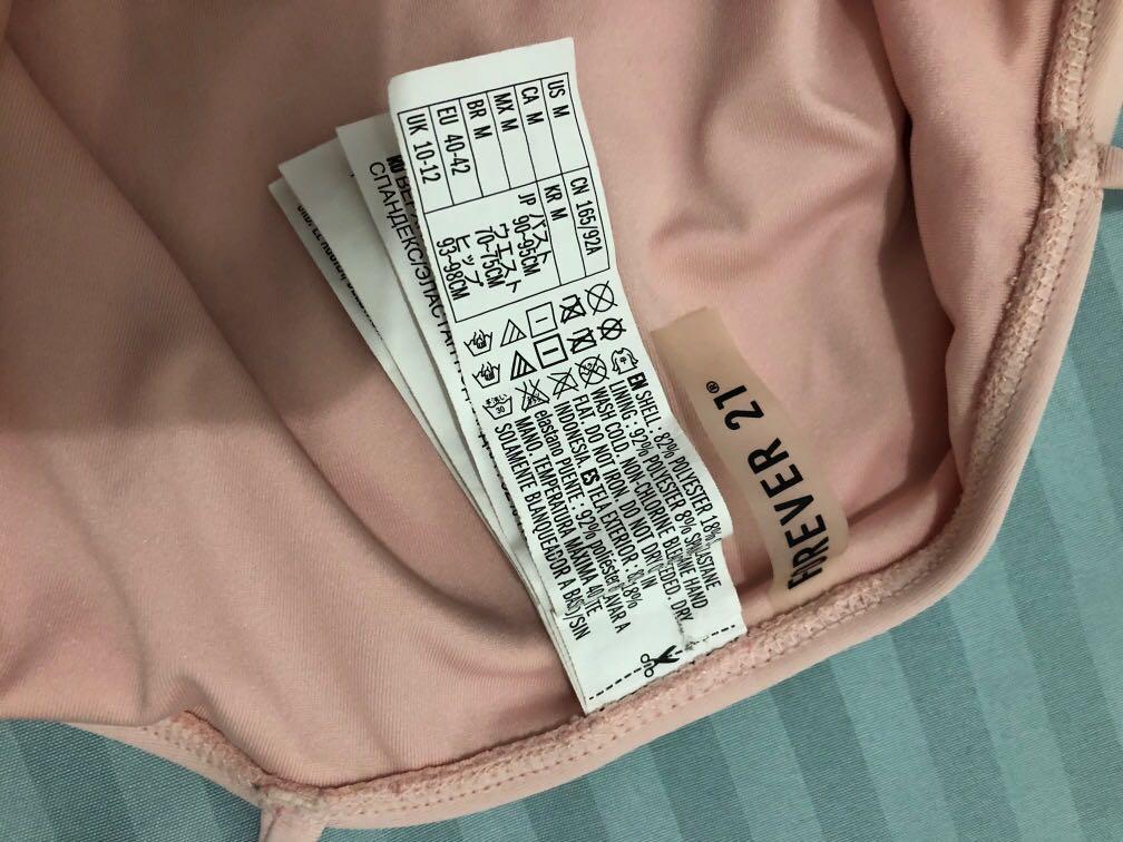 Forever 21 blush/baby pink bikini (Category: Bikinis & Swimsuits) located in Quezon City. Submitted by ptriestodeclutter (Listing ID 1032522062, Image 3). Description: Blush/ baby pink, medium bikini Used twice, in 10/10 condition.