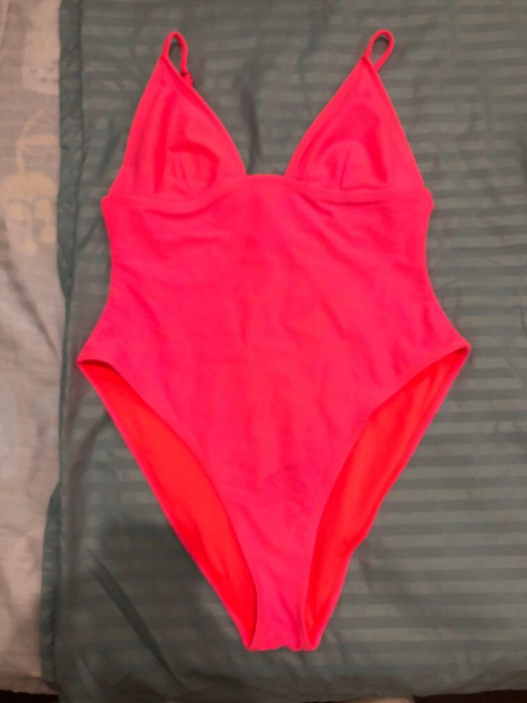 Forever 21 pink/orange bikini (Category: Sleeveless) located in Quezon City. Submitted by ptriestodeclutter (Listing ID 1032521869, Image 1). Description: With a couple of stains that could be hidden with a cover up or shorts.