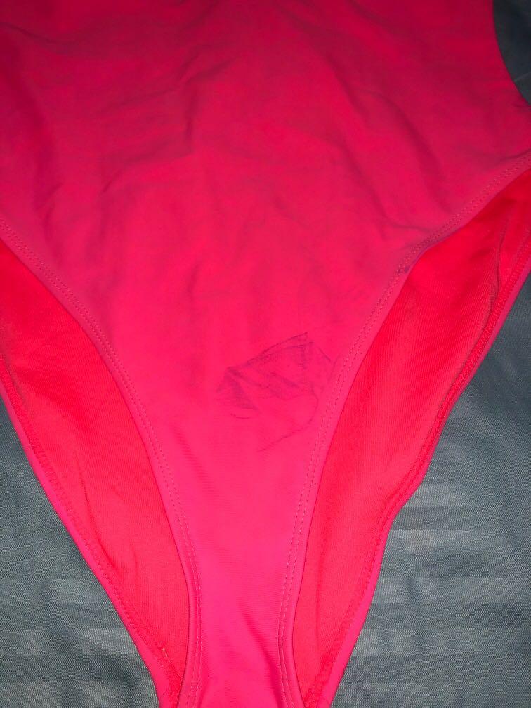 Forever 21 pink/orange bikini (Category: Sleeveless) located in Quezon City. Submitted by ptriestodeclutter (Listing ID 1032521869, Image 2). Description: With a couple of stains that could be hidden with a cover up or shorts.
