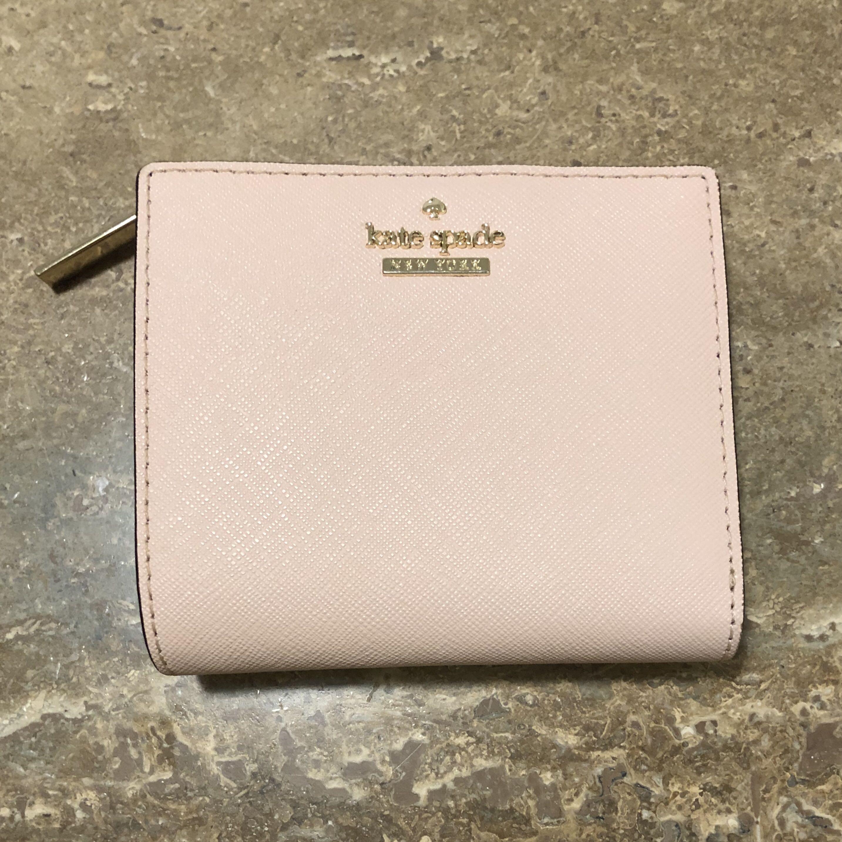 Warm vellum kate spade wallet clearance