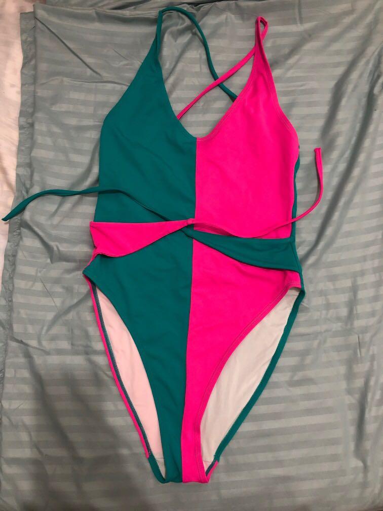 H&M bikini (Category: Bikinis & Swimsuits) located in Quezon City. Submitted by ptriestodeclutter (Listing ID 1032525096, Image 1). Description: New but tags cut H&M Stranger things collection Pink and blue green bikini.
