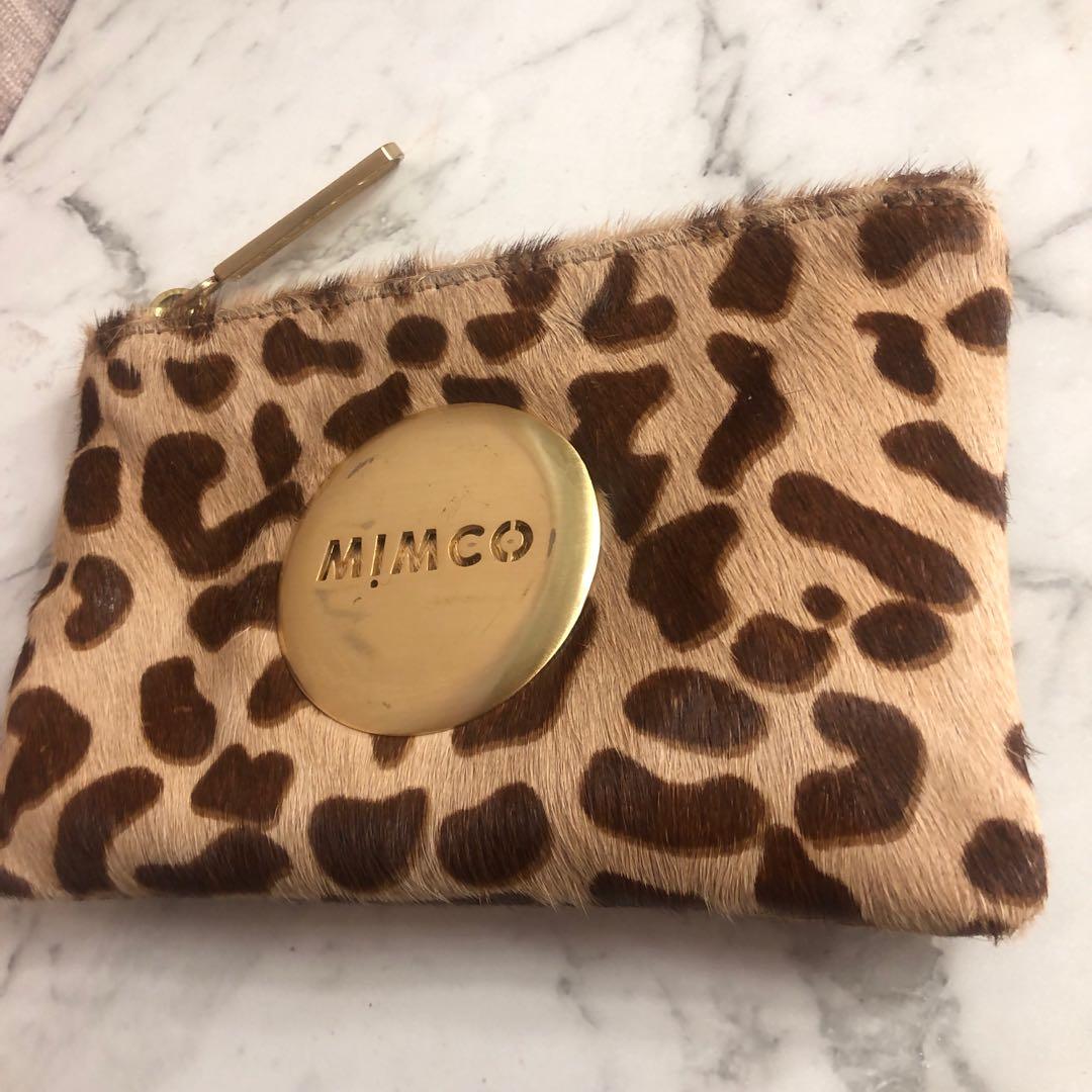 Mimcopouch (Category: Women's Bags & Wallets) located in Bronte. Submitted by luxecloset1 (Listing ID 1032336007, Image 2). Description: Leopard print small mimco pouch Has been used, some marks on the golf hardware as shown, other than that perfect condition Stunning fur type texture.