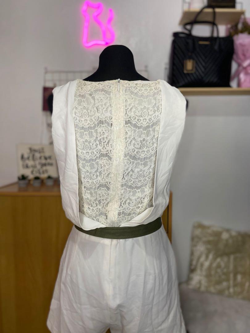 White sleeveless romper (Category: Rompers) located in San Jose del Monte. Submitted by _ecjc (Listing ID 1032456675, Image 2). Description: Lace sa likod. Perfect lagyan ng black belt..