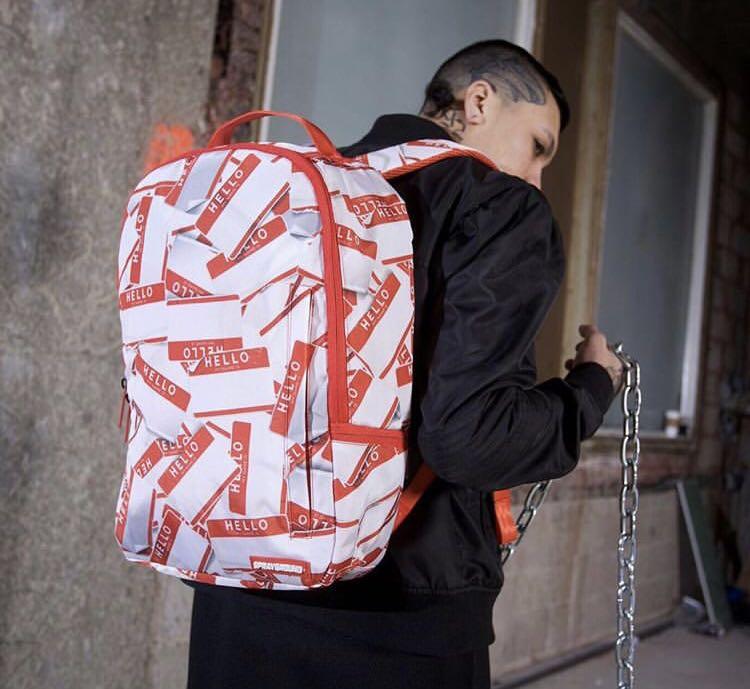 Sprayground tag backpack, Men's Fashion, Bags, Backpacks on Carousell