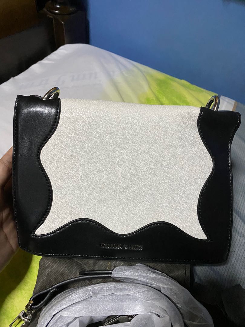 Charles and Keith Sling Bag Black and White