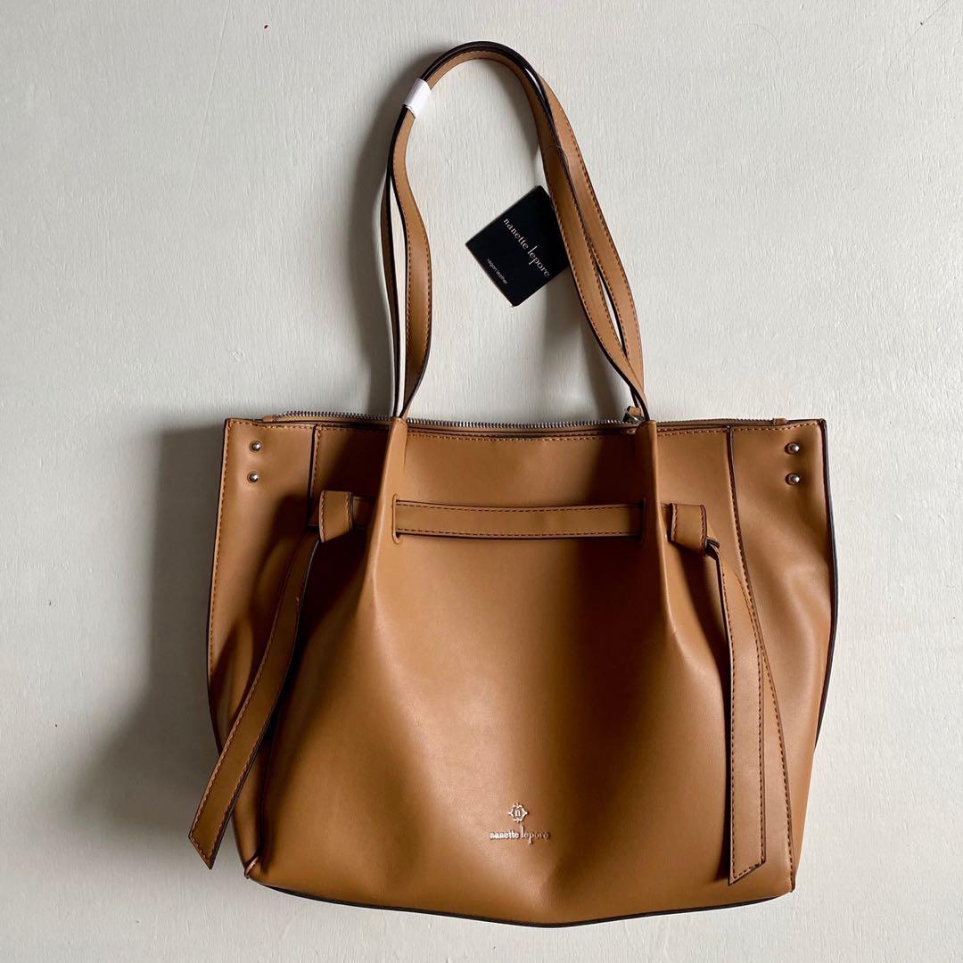 Nanette Lepore Anetta Bag (Category: Beach Bags) located in Paranaque City. Submitted by ooh.la.la (Listing ID 1034845614, Image 1). Description: Nanette Lepore Anetta Double Handle Handbag Brand new, bought in the US With Original tag - Dual top handles - Top zip closure - Exterior features front knot strap detail, logo accent, studded details, front and back slip pockets with magnetic closures - Interior features 2 media pockets and wall zip po