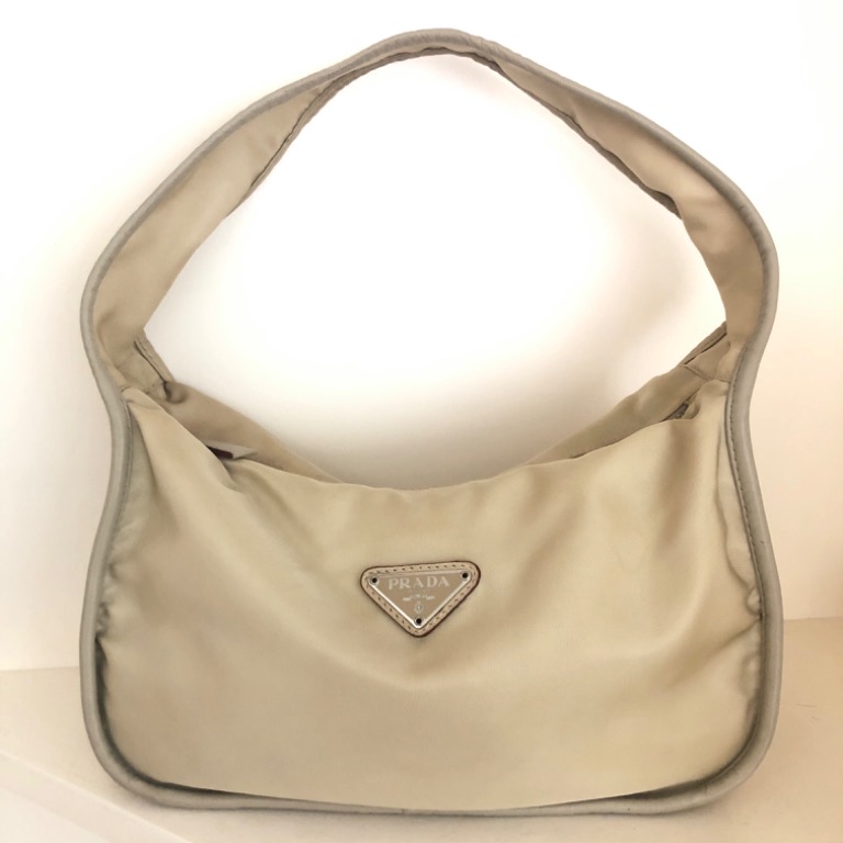 Prada Tessuto hobo nylon bag in beige, Luxury, Bags & Wallets on Carousell