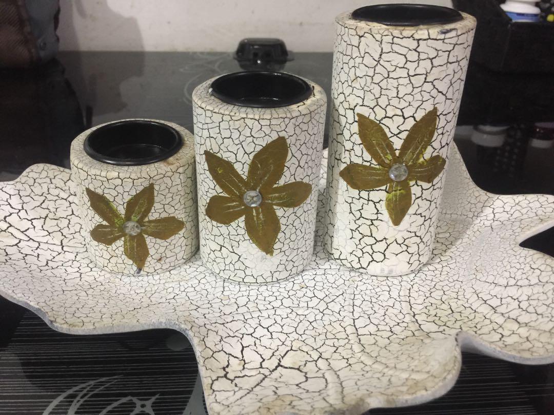 Elegant Candle Holder (Category: Other Home Decor) located in Quezon City. Submitted by rmave (Listing ID 1035097065, Image 1). Description: White & Gold Candle Holder Elegant and Unique design Perfect for center and console table In good condition just needs a little cleaning Hard material and Washable Price: P800 Last Price: P400( dont ask, fixed na!) Sf by the buyer.