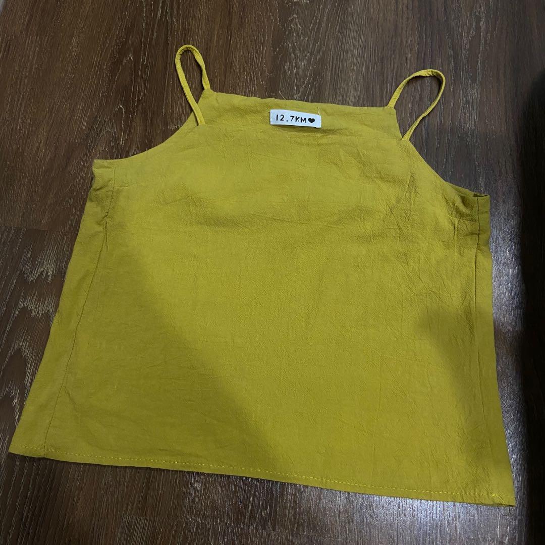 mustard yellow sleeveless top