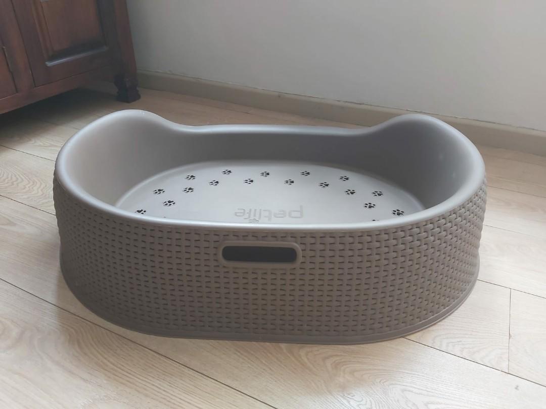 grey plastic dog bed