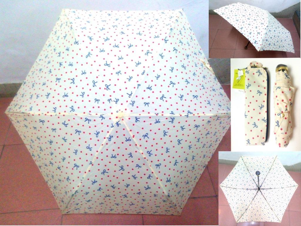 99 新 日本超跣水w P C 滴水不沾防水迷你超輕縮骨雨傘 連拉鍊傘袋 淺黃色底紅圓點蝴蝶花 其他 其他 Carousell