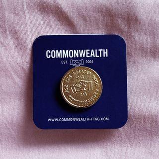 Commonwealth handshake pin