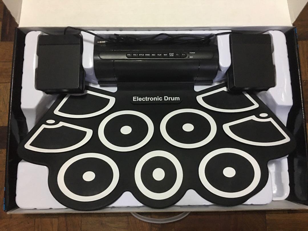 Portable Electronic Drums 9 pads silicone (Category: Musical Instruments) located in Manila. Submitted by dl_online_shop (Listing ID 1035117241, Image 1). Description: Brand new electronic drum pads Package includes: • 9 pads (open/close hi hat, 2 crash cymbals, hightom, ride cymbal, low floor tom, snare and bass. Also foot pedals are included. • drum sticks, adapters •with built in speaker Message us if you are interested Cash on delivery and Ca