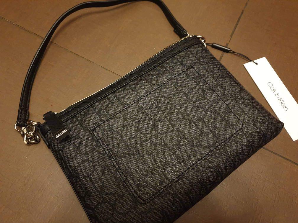 Monogram logo hotsell shoulder zip bag