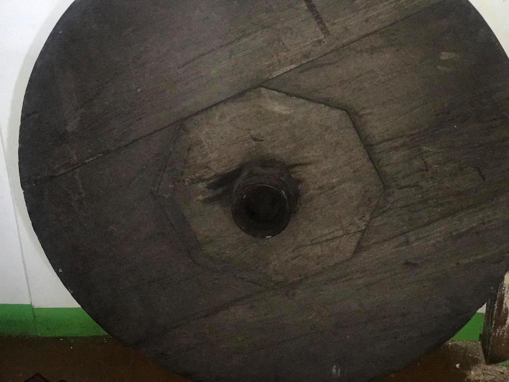 Large antique solid molave cart (kariton) wheel (Category: Outdoor Furniture) located in Quezon City. Submitted by manilantik (Listing ID 1035402394, Image 1). Description: This intact large and very heavy molave cartwheel measures 100 cm (40”) in diameter and is two inches thick. Made from three thicks slabs of molave, the steel rim and axel are intact. Perfect for garden landscaping. Viewing and pick-up by appointment. .