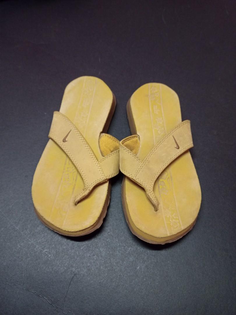 yellow nike slippers