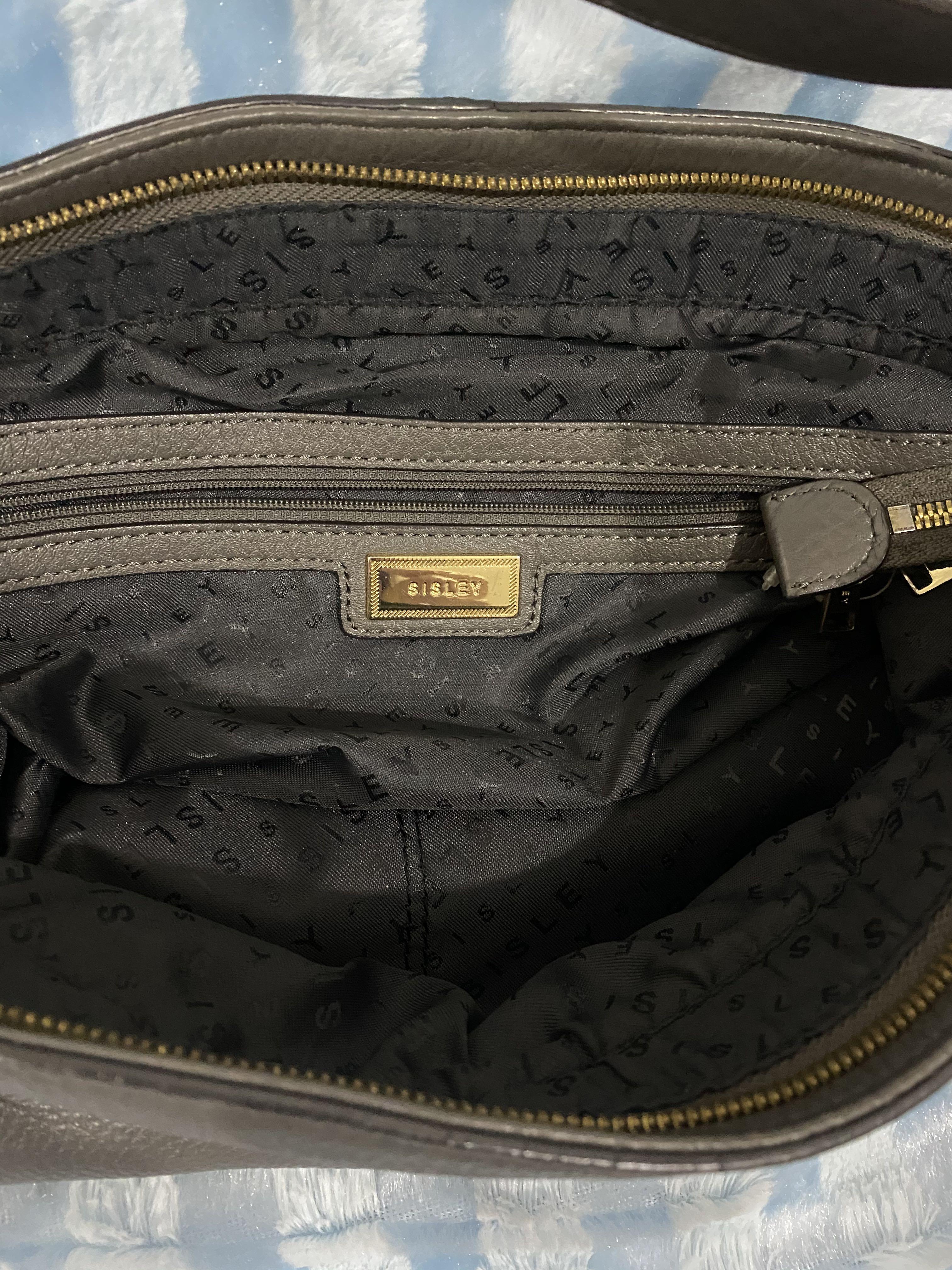 Original Sisley Gray Shoulder Bag (Category: Shoulder Bags) located in Quezon City. Submitted by seriliz (Listing ID 1035498553, Image 3). Description: Preloved Authentic Sisley Shoulder Bag - gold hardware - preloved - soft leather but no cracks .