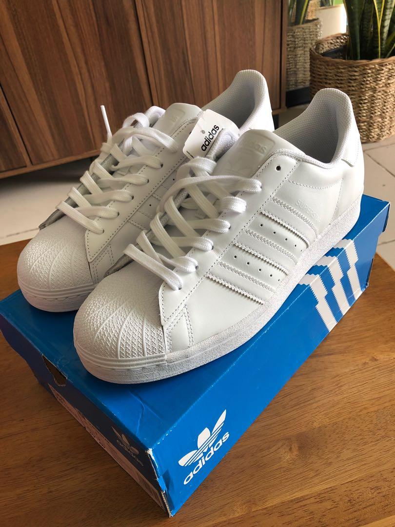 triple white adidas superstars