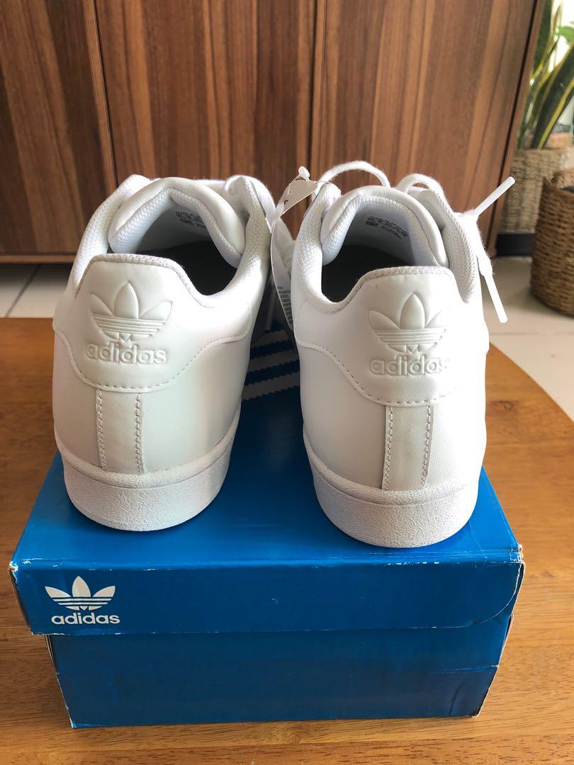 triple white adidas superstars