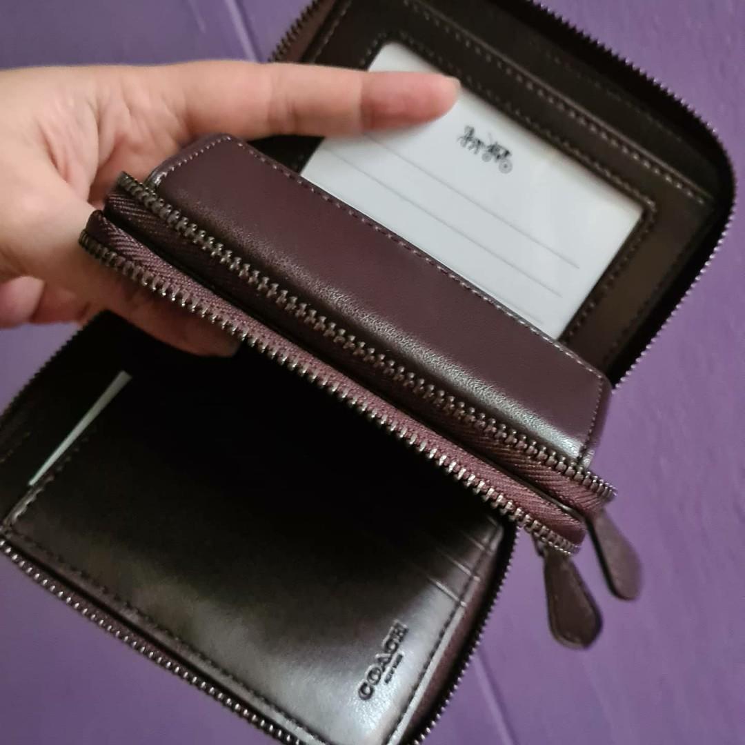 Original coach double zip wallet in colorblock (Category: Wallets & Card holders) located in Paranaque City. Submitted by impulsehoarder (Listing ID 1035744743, Image 2). Description: 💯 Original from US Limited edition Double zip Front is magenta, back is purple Leather insides Available for layaway.