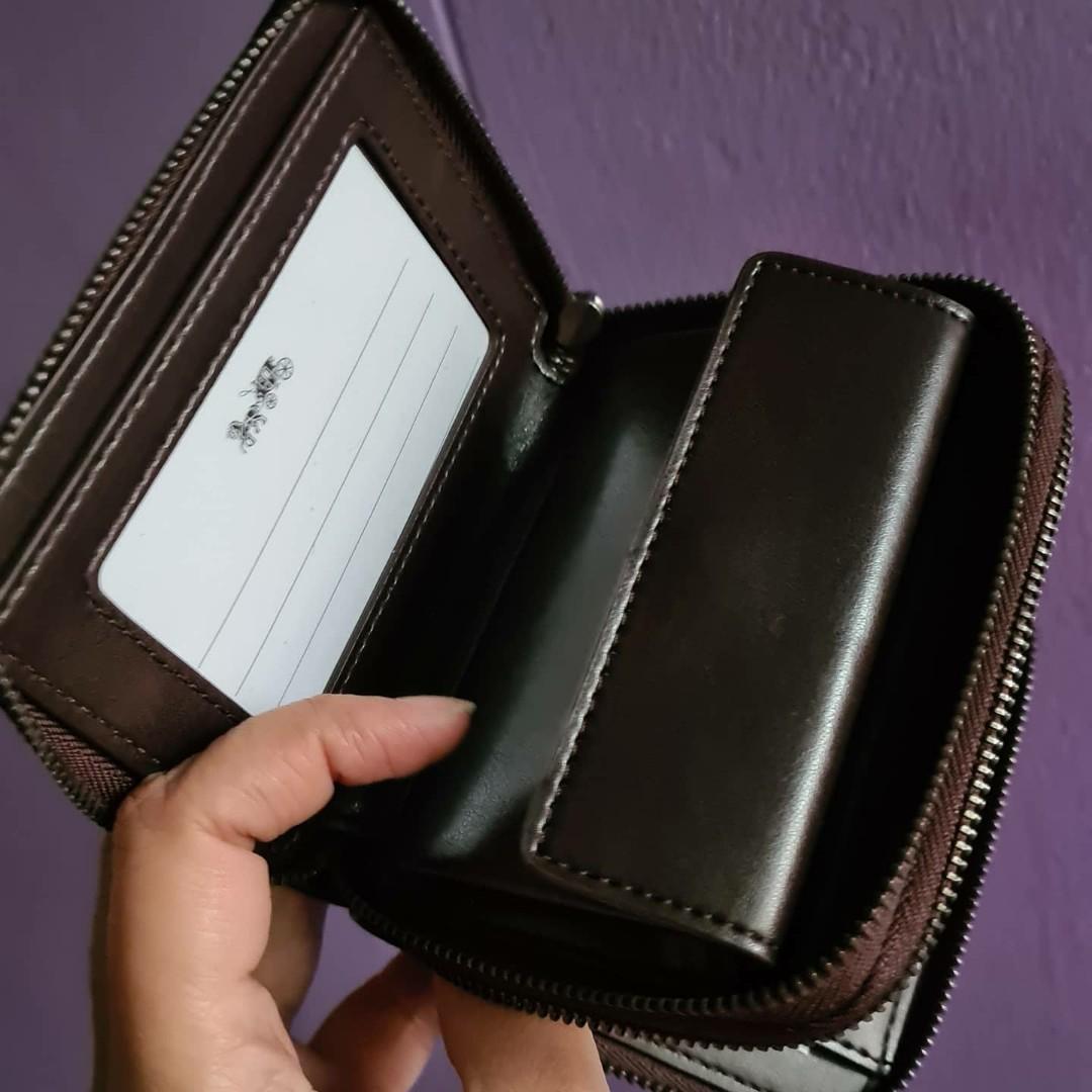 Original coach double zip wallet in colorblock (Category: Wallets & Card holders) located in Paranaque City. Submitted by impulsehoarder (Listing ID 1035744743, Image 3). Description: 💯 Original from US Limited edition Double zip Front is magenta, back is purple Leather insides Available for layaway.