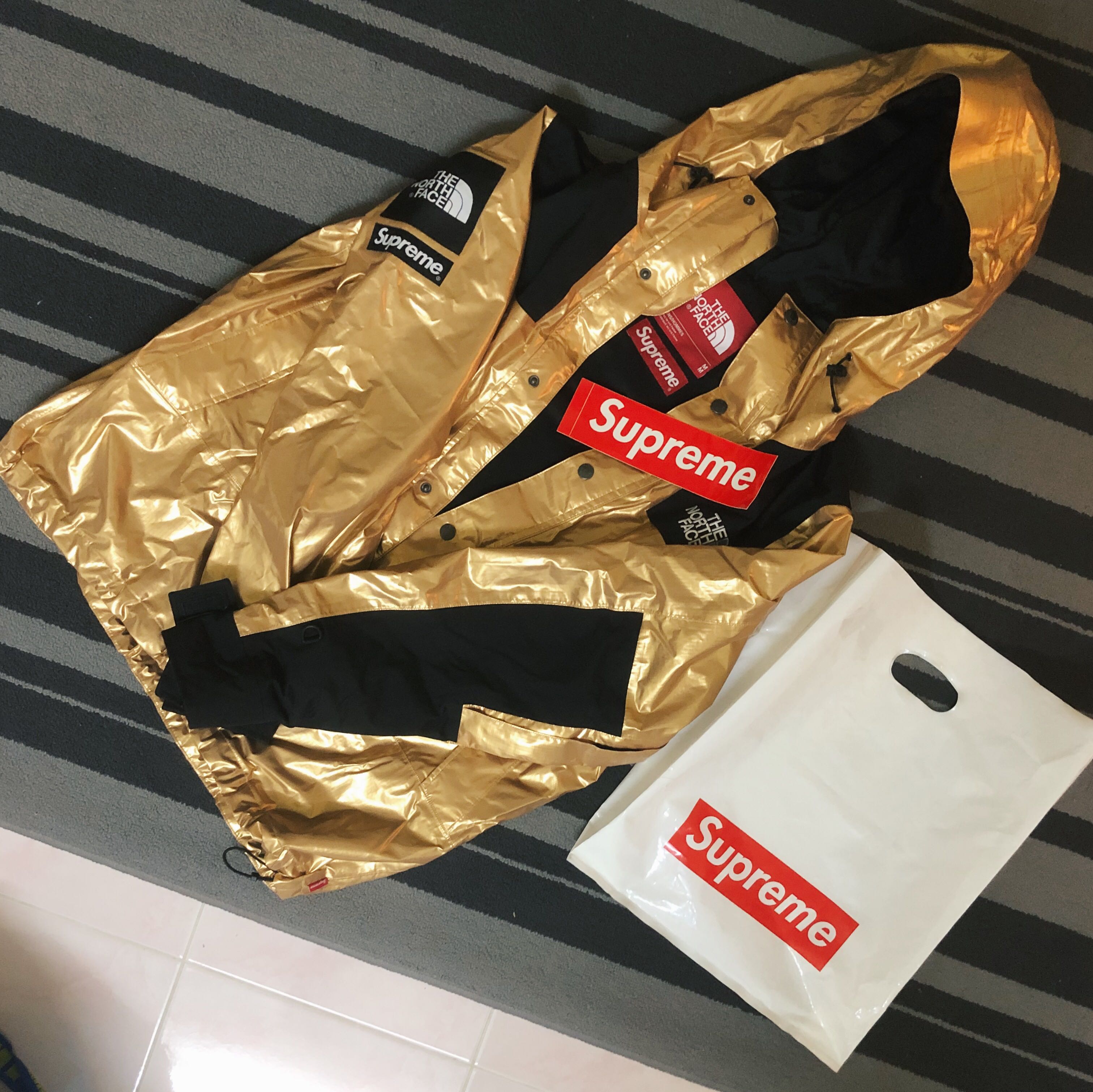 Supreme tnf gold discount parka