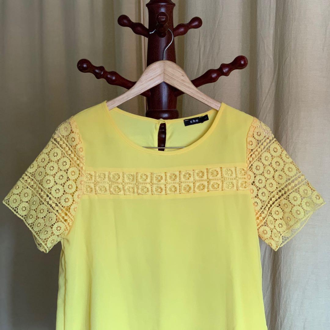 yellow patterned blouse