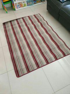 Maroon carpet / area rug