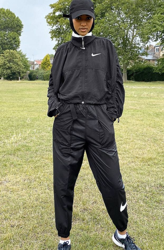 Nike ruched sleeve hotsell swoosh zip jacket