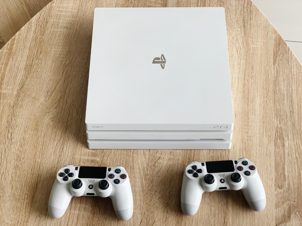 PS4 Pro 1TB 15 games 2 Controllers Rare Glacier White Edition includes COD GOW FIFA DIablo etc
