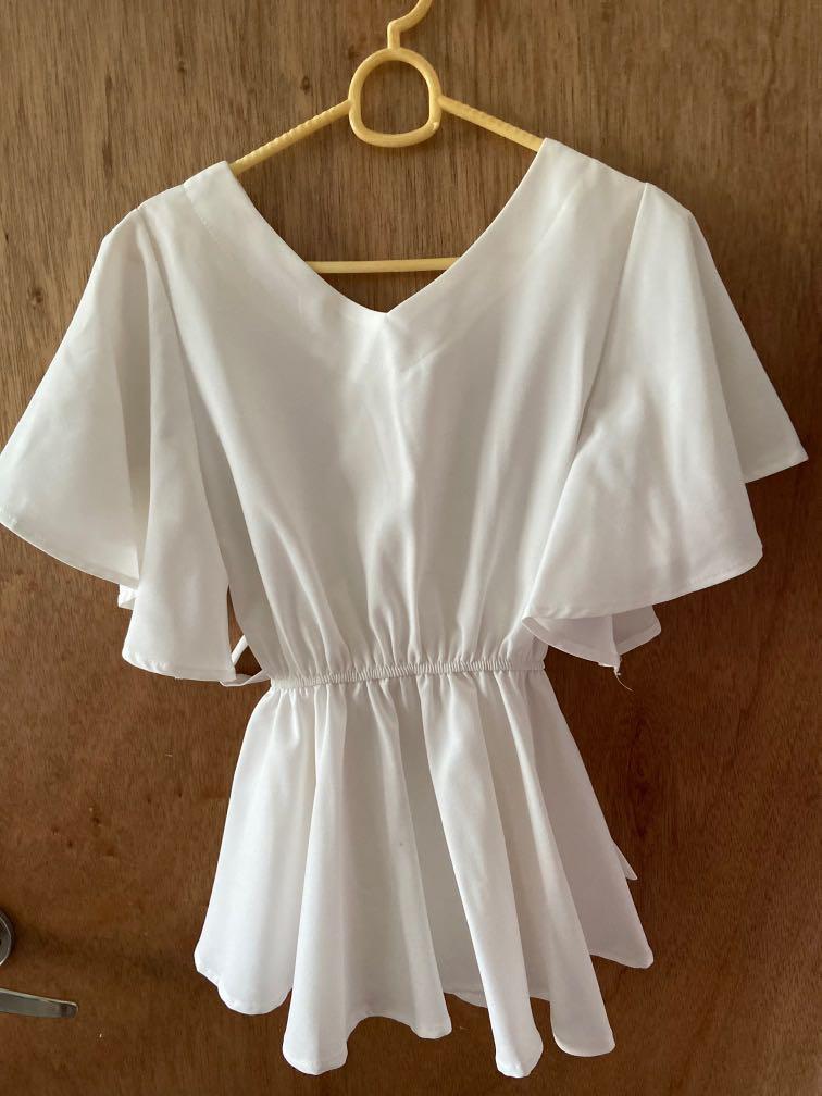 white peplum top with sleeves