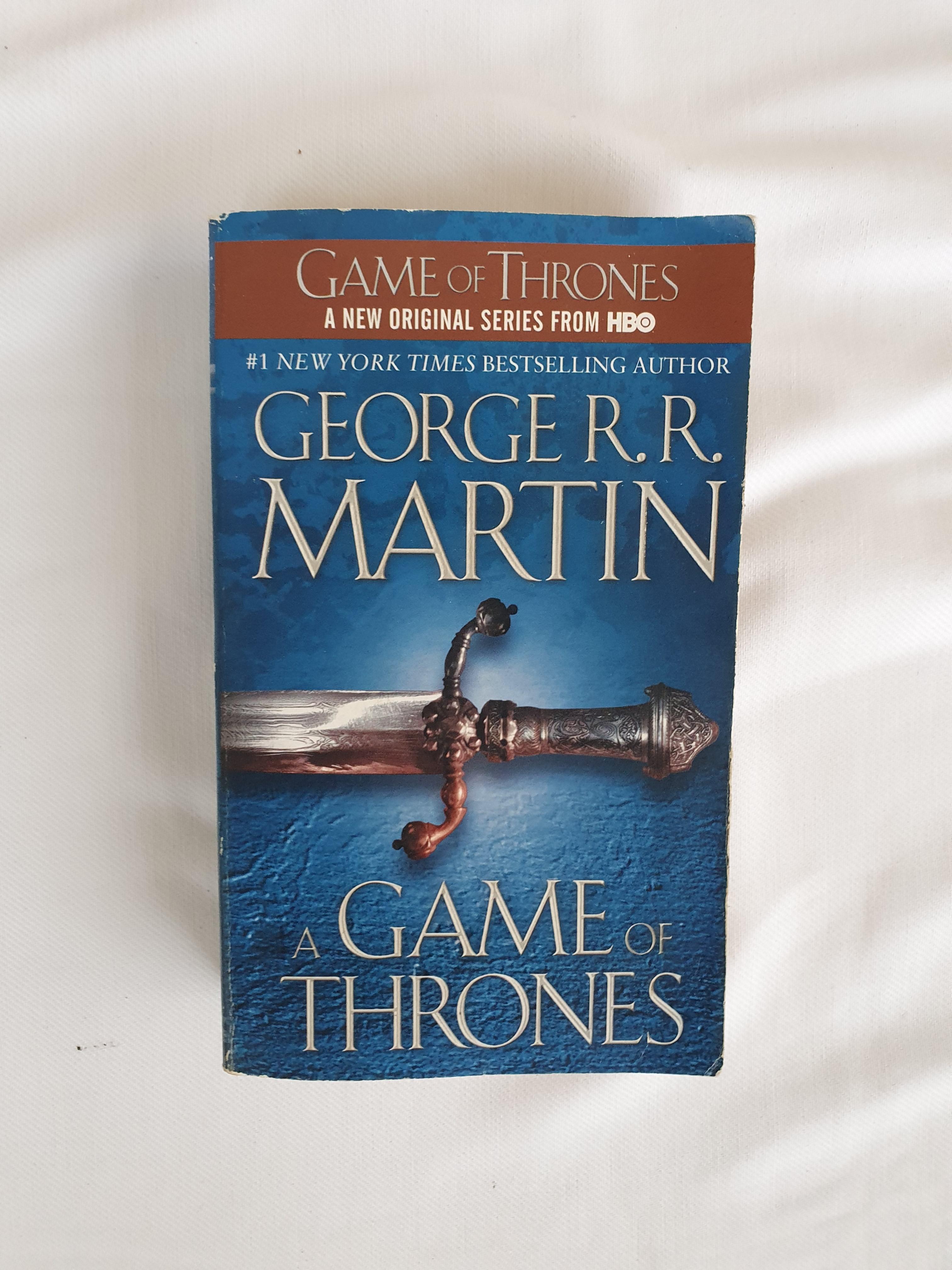 A Game of Thrones (Category: Storybooks) located in Santa Rosa. Submitted by den.j (Listing ID 1036269842, Image 1). Description: has a small tear at the back.