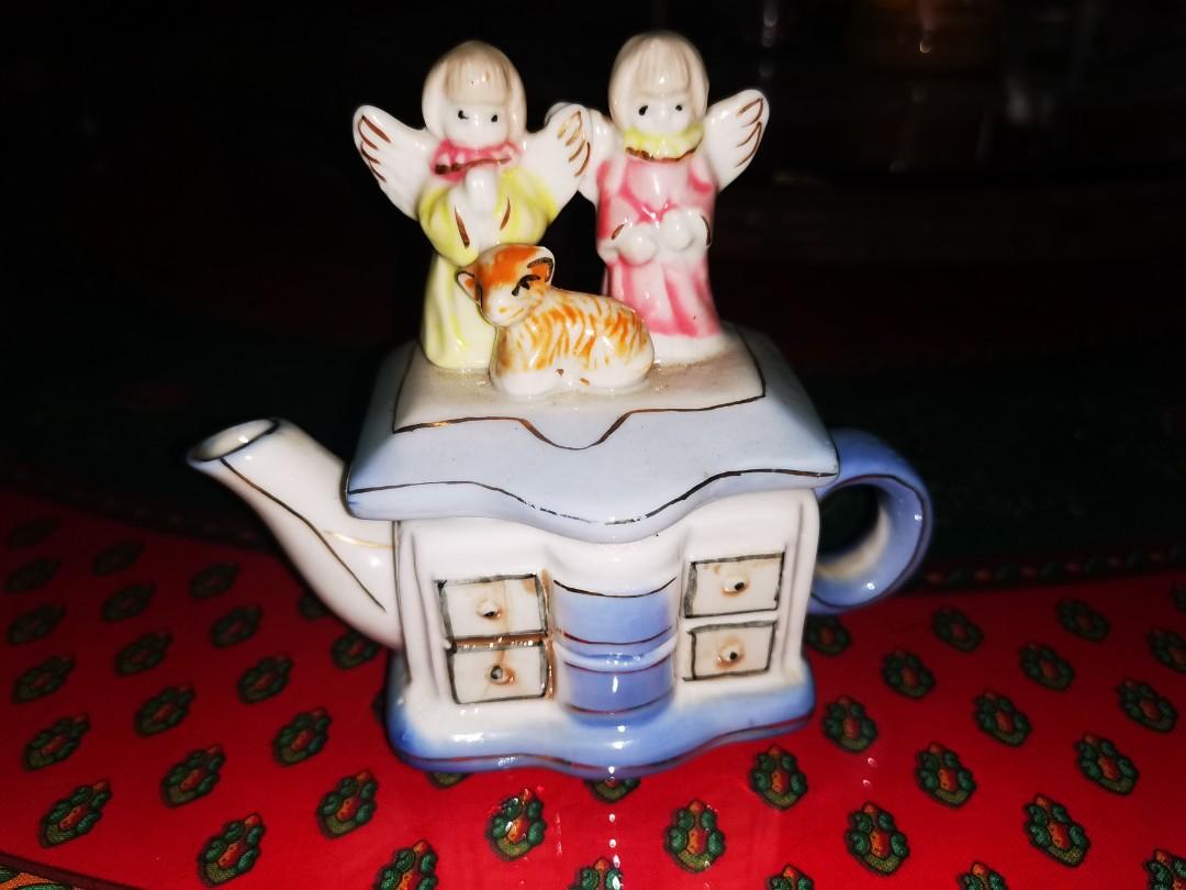 Angel ceramic coffee pot decor (Category: Coffee & Tea Tableware) located in Quezon City. Submitted by belikabim2014 (Listing ID 1032741208, Image 1). Description: Angel ceramic decorative piece Shpng via courier of choice under buyers account Payment advanced by rider.