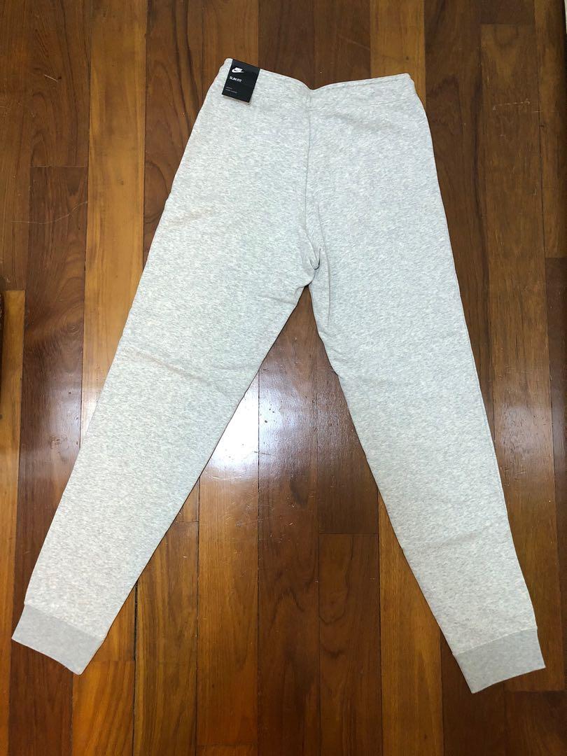 Nike rally grey swoosh logo shop slim joggers