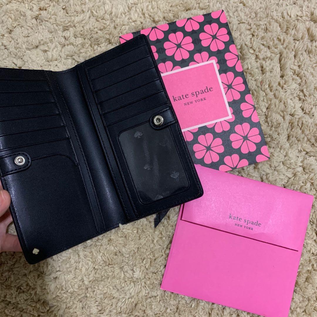 KATE SPADE WALLET FOR SALE! 😍♥️ (Category: Luxury Bags & Wallets) located in Antipolo. Submitted by claralayne (Listing ID 1032710982, Image 3). Description: Hi! ORIGINAL KATESPADE wallet for sale! 😍🤍 -kate spade slim cameron saffiano leather -used once -Bought last feb 2020 in US -No issues -No box included kasi nasira sya nung pinadala :( -Medium size (fits ph money don’t worry) Rfs: Decluttering .