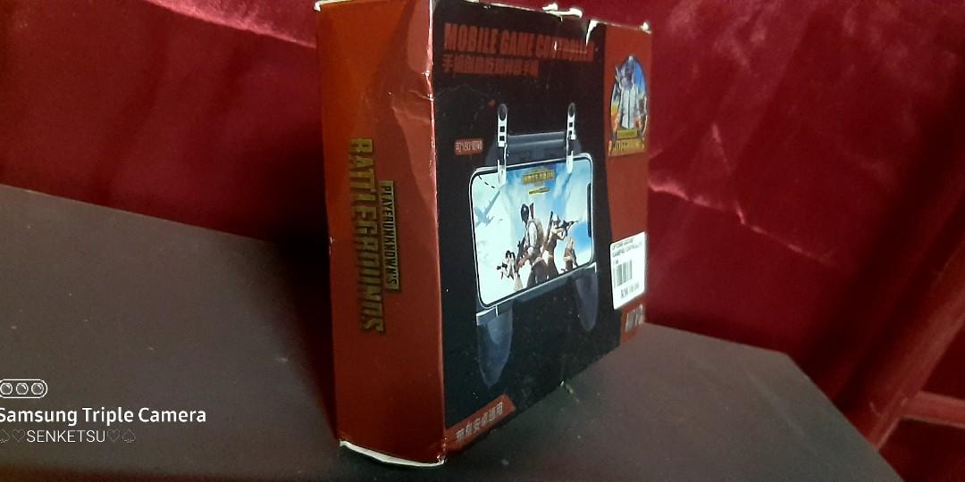 MOBILE GAME CONTROLLER (Category: Controllers) located in Ipoh. Submitted by danielarash20 (Listing ID 1032698721, Image 2). Description: ‼JUALAN MURAH MOBILE GAME CONTRILLER‼ ✅KHAS UNTUK SURVIVAL GAME (PUBG,COD,FREE FIRE DAN LAIN²) CONDITION KOTAK AGAK KURANG 7/10 ✅CONTROLLER GAME CUN 9/10.. ✅POS+RM10.